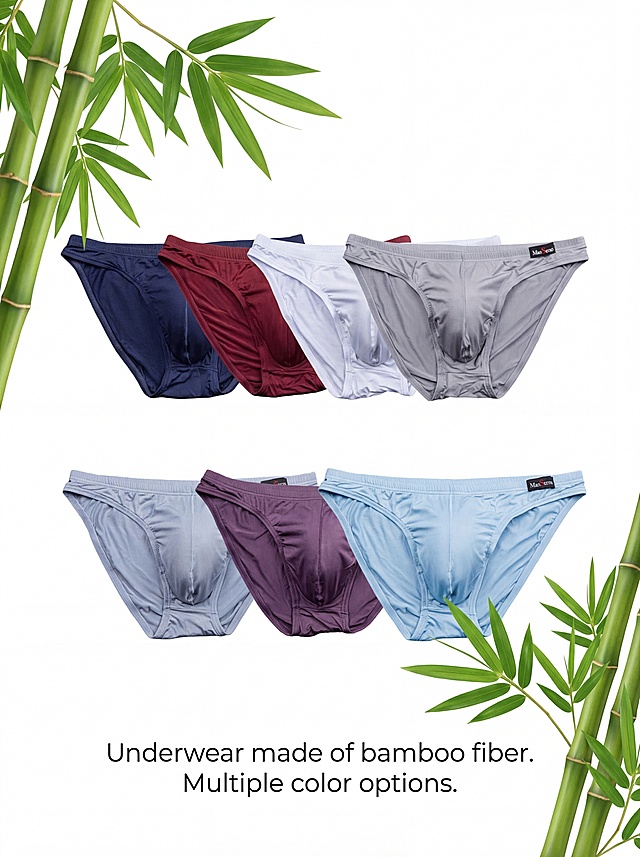 使用这七张抠好的男士三角内裤图片，保持它们原有的颜色和款式不变，将它们整齐排列在一张画布上，排版均匀美观，在画面角落添加真实竹子绿叶作为装饰，在图片底部添加文字文案'Underwear made of bamboo fiber. Multiple color options'，简约干净的商务电商宣传设计