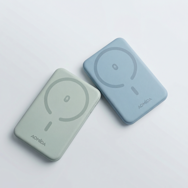 奥米达磁吸充电宝，保持产品外观和品牌logo完全不变。更换为简约干净的浅灰白色背景，柔和漫射光影，突出冰湖蓝和浅灰绿两款产品的磨砂质感。保持物理结构绝对不变，商业3C摄影，8K分辨率，极高保真渲染，极预览效果