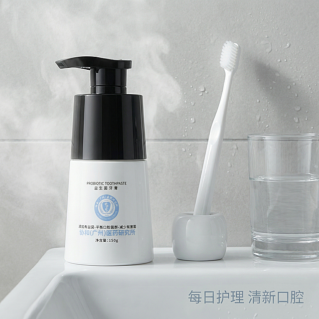 [主图 4] 益生菌牙膏浴室使用场景
[氛围/风格] 生活化场景，清新舒适，真实自然
[画面元素] 商业摄影质感，光线柔和通透，产品清晰真实，画面干净高级。益生菌牙膏放置在浴室洗手台的陶瓷台面上，旁边搭配干净的牙刷和透明水杯，背景是浅灰色瓷砖墙面，带轻微水雾氛围，呈现日常使用场景。牙膏产品外观保持与原图一致，保留所有原有文字信息，去除任何多余AI生成文字标识
[配色色系] 主色调：浅灰冷调；辅助色：产品黑白，陶瓷白色
[视角构图] 平视构图，产品自然摆放，景深适中，背景虚化突出主体
[文字版式] 主标题"每日护理 清新口腔"放置在洗手台右下角负空间，浅灰蓝色字体，不遮挡产品主体
[比例分辨率] 1:1比例，文字清晰可辨，4K超高清
[负向提示词] 变形，水印，文字错乱，产品图模糊，背景杂乱，多余文字标识，AI生成文字