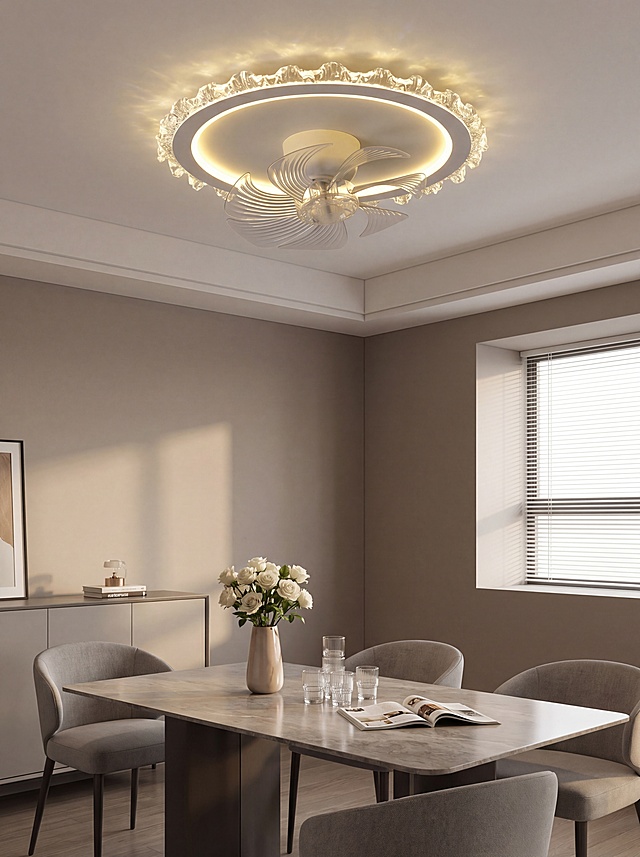 风扇吸顶灯，严格参照上传产品图https://gdesign-dam-hz.dancf.com/36534578974416003/bda30aa721c545a7b08f48b75be7c554.jpg，完整保留所有可见组件、部件、轮廓形状、结构、比例、材质质感、颜色与上传图完全一致。
现代家居餐厅空间，参考图https://1.jpg为现代家居风格，相似度30%。
暖调轻奢浅灰棕色系色调。
顶装安装于餐厅天花板，产品自然融入场景光影，与场景共处同一物理空间。
自然光结合暖黄室内灯光，产品受光面泛起暖棕暖色、暗部映射浅灰光晕，与环境物理融合。顶部天花板产品中景，居中构图，微侧25°视角。
全量换款清单：①墙面：参考图米白护墙板 → 生成图浅灰艺术涂料；②天花板：参考图素色水泥顶 → 生成图悬浮双眼皮吊顶；③家具：参考图双人床 → 生成图岩板长方形餐桌；④餐椅：参考图无餐椅 → 生成图四把浅灰布艺餐椅；⑤软装：参考图少量软装 → 生成餐桌中央长方形陶瓷花瓶配白色玫瑰花+侧边餐边柜+桌上透明玻璃水杯，餐桌上放置一本打开的杂志。
消除营销卖点文字，仅保留产品本身。
4K分辨率，严格锁定宽高比为 3:4。