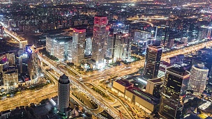 T/L MS HA PAN北京中央商务区和夜间照亮的摩天大楼