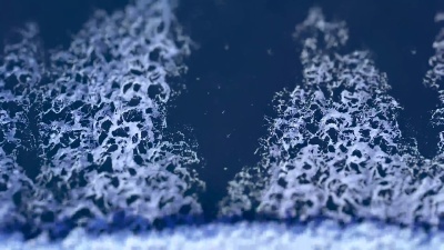 深蓝色海洋的空中镜头，具有翻滚的波浪和倾斜移动效果，顶部和底部模糊，焦点在中间。