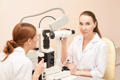 ophthalmologist doctor in exam optician laboratory