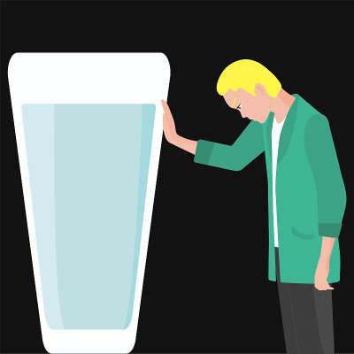 酒精中毒的概念。一个年轻人试图戒酒。一个穿绿色外套的人推开一杯酒精饮料。人类消极的面部表情，感受生活