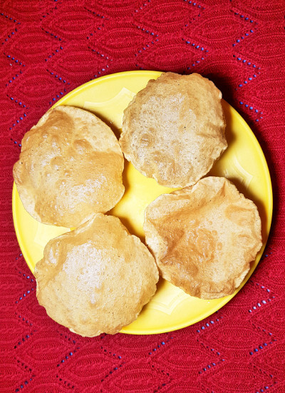 广受欢迎的印度菜Poori——一种印度面包
