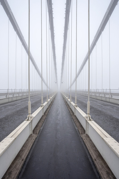 Clifton Suspension Bridge in Bristol UK in thick f