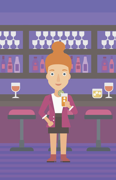 Woman holding glass of juice