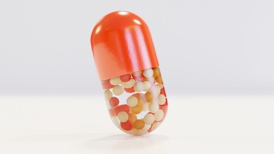 3d插图现实的3d不同颜色的药物药丸，彩色胶囊，止痛药，抗生素，维生素和阿司匹林。药房和药物，药物剂