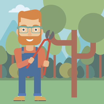 Farmer with pruner in garden