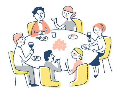 Men and women having a supper