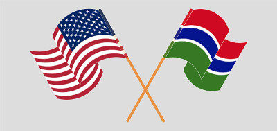 Crossed flags of the USA and the Gambia