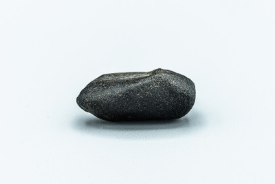 Black magnetic Tektite Meteorite isolated, piece o