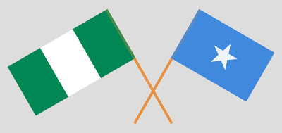 Crossed flags of Nigeria and Somalia. Official col