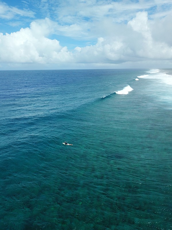 Surfing drone view in Pohnpei, Micronesia