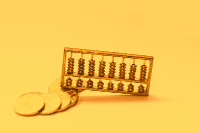 金算盘放在金币上