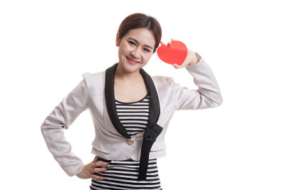 亚洲商业女人与红心。