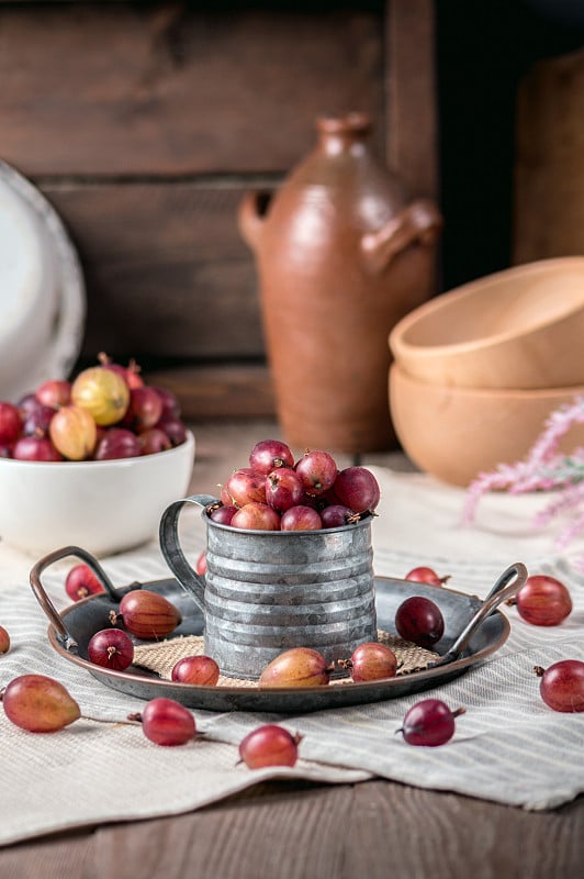 Bowl with fresh sweet gooseberries