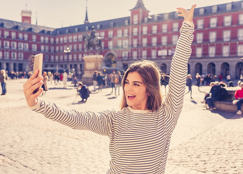 Beautiful young caucasian student tourist woman ta