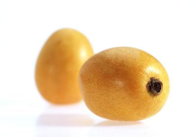 Medlars, eriobotrya japonica, Fruits against White