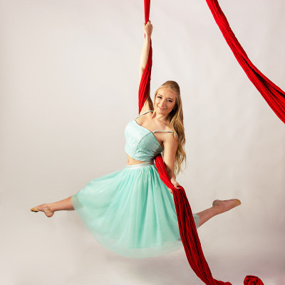Girl training on aerial silks