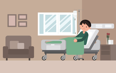 男子病人正在医院病床上休息。
