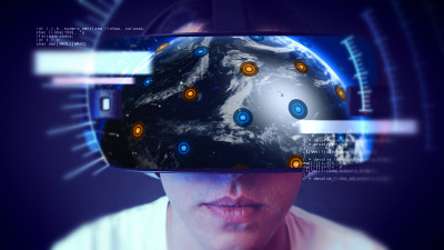 帅气的年轻人戴着VR头戴体验虚拟现实。
