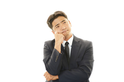 不满意的亚洲商人