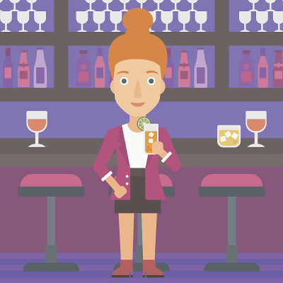 Woman holding glass of juice