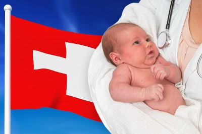 瑞士的出生率。新生婴儿在医生手中。