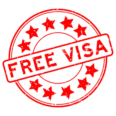 Grunge red free visa word with star icon round rub