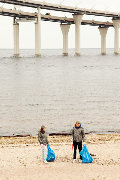 Two environmental volunteers, man and woman, with 