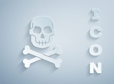 Paper cut Skull on crossbones icon isolated on gre