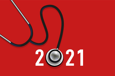 红色背景下以脂肪窥镜为标志的2021年健康贺卡。