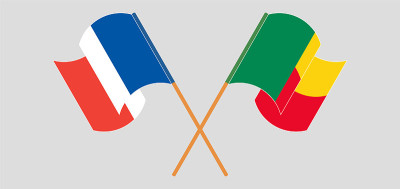 Crossed and waving flags of Benin and France