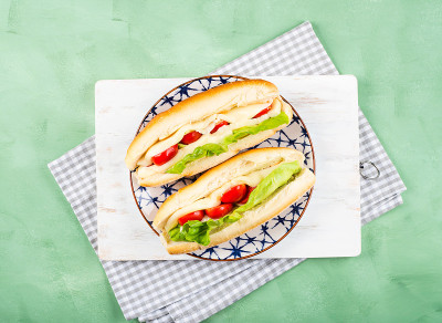 Baguette sandwich with tomatoes and cheese