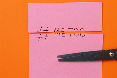 The inscription on the sticker metoo torn in half