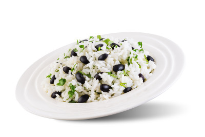 Black bean cilantro lime rice in a plate on a whit