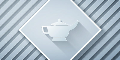 Paper cut Magic lamp or Aladdin lamp icon isolated