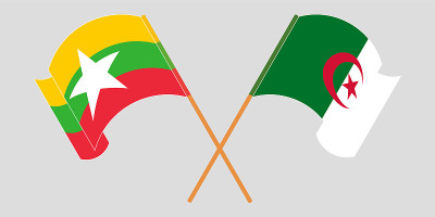 Crossed and waving flags of Myanmar and Algeria