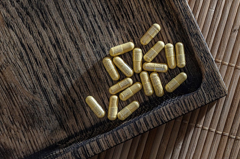 close-up of liv-gall cleanse capsules. dietary con