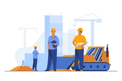 戴头盔的建筑工人们在建筑工地工作