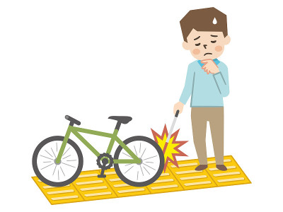 一名视障男子的插图，他把自行车放在盲文街区上，行走困难