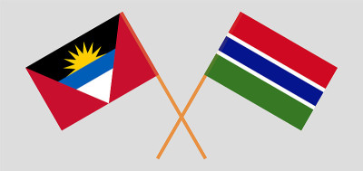 Crossed flags of the Gambia and Antigua and Barbud