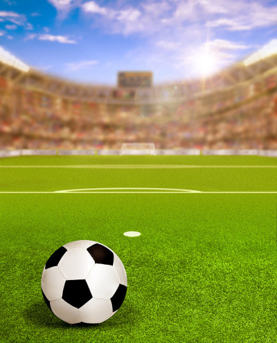 SSoccer Arena With Sun Flare and Ball on Field