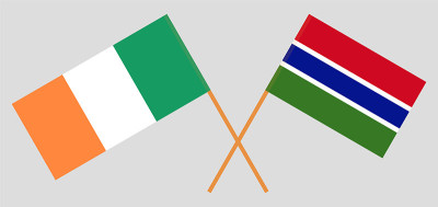 Crossed flags of Ireland and the Gambia