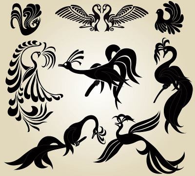 set of abstract different birds silhouettes on whi