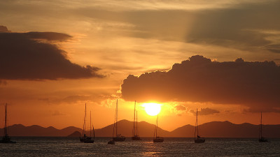 Sunset over the ocean with orange sky at Phra nang