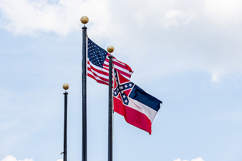 Flag poles with Mississippi State flag and Unites 