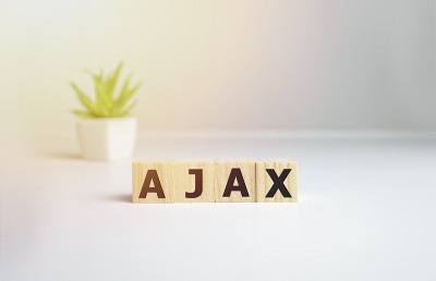 Ajax -立方体与字母和单词在白色背景，软件，互联网类别，木制立方体。