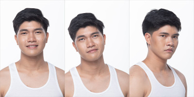 亚洲男人化妆后的发型。没有修整